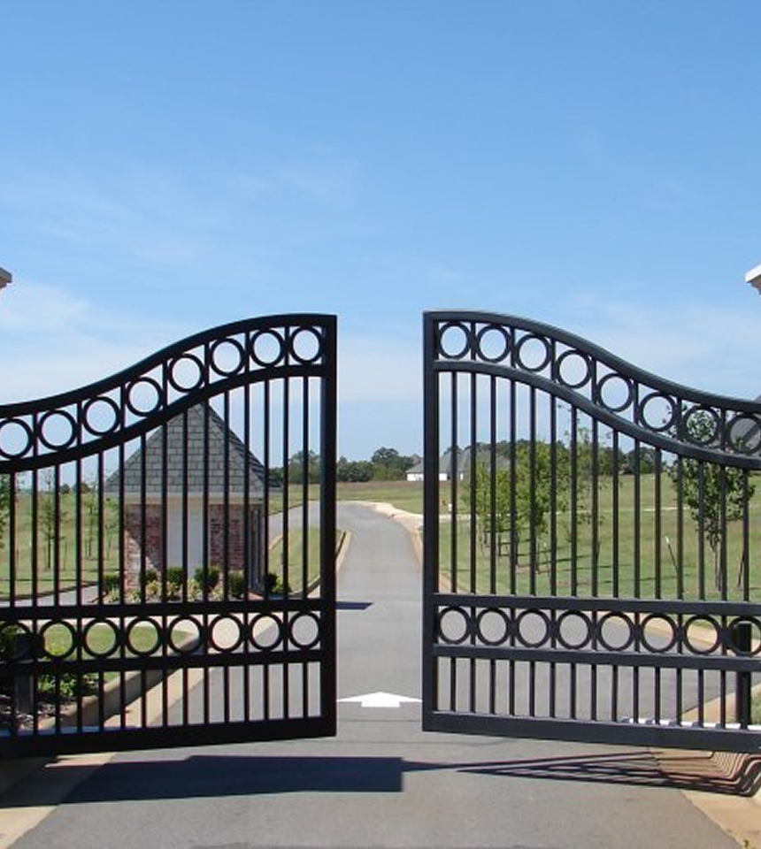 Man Using Measuring Tape in Factory Setting Man Using Measuring Tape in Factory Setting